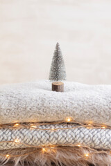 Christmas little trees and golden lights bokeh.