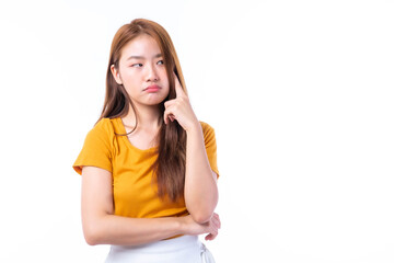 Fototapeta premium Young beautiful Asian woman pointed a finger to her head and smiled isolated on white background ,She shows that she is coming up with new plans to get her work done