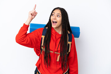 Hiker teenager girl with braids over isolated white background intending to realizes the solution while lifting a finger up