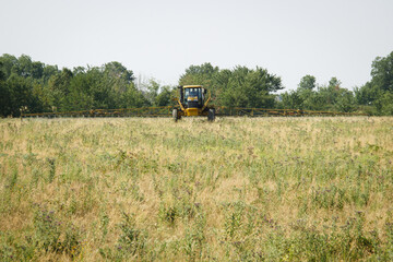 Fototapeta premium rogator tractor spraying