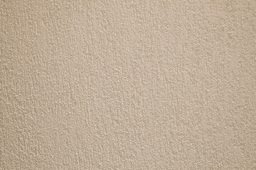background of a neutral-colored wall with graffito paint