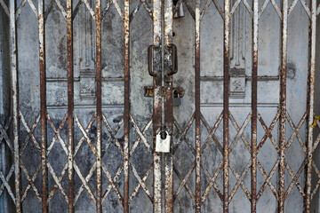 Classic old wooden door and rusty lock        