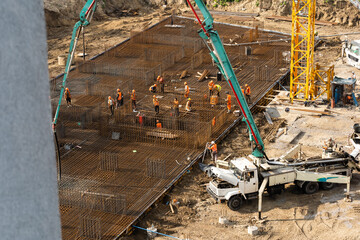 construction site, concrete pouring, piles