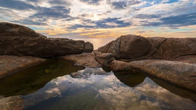 4k ko samui timelapse footage ,morning sunrise with cloud sky move over the rock beach,Lad Koh View Point ,koh samui island,surratthani ,thailand 