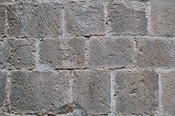 Marks of stonemasons in Castillo de Loarre in Huesca - obrazy, fototapety, plakaty