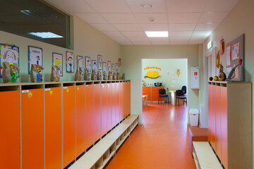 Modern day care nursery or pre-school, spacious interiors, lockers and storage