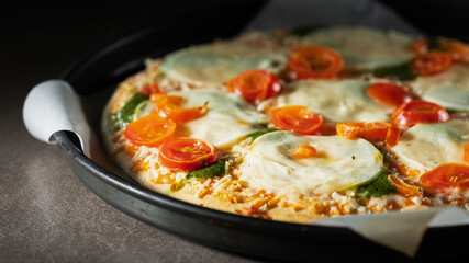 pizza with tomato and mozzarella