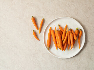 baby carrots on a plate 