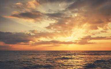 Golden sunset over the ocean.