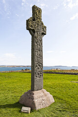 St Martins cross dating from the late eighth century at Iona Abbey, Iona, off the Isle of Mull,...