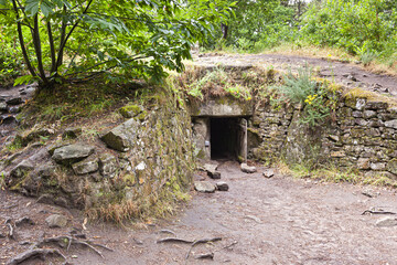 The entrance to Kercado Tumulus, a megalithic monument near Carnac, Brittany, France