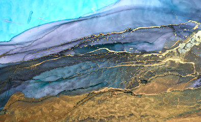 Luxury abstract background in alcohol ink technique, indigo blue gold liquid painting, scattered acrylic blobs and swirling stains, printed materials