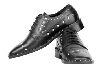 Women's leather boots close-up black color. Oxford style shoes. Casual shoes.  File contains...