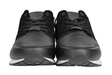 Pair of new non-branded black athletic trainers or trainers isolated on white background. File contains clipping path. Full depth of field.