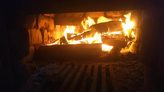 Firewood Burns In A Brick Oven. Fire Close-up, Natural Flame In The Fireplace