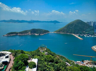 Aberdeen Channel. Coast of Hong Kong Island. Islands, sea and residential houses