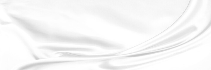 White gray satin texture that is white silver fabric silk panorama background with beautiful soft blur pattern natural.