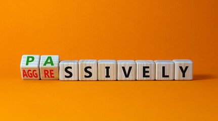 Passively or aggressively symbol. Turned wooden cubes and changed the word passively to...