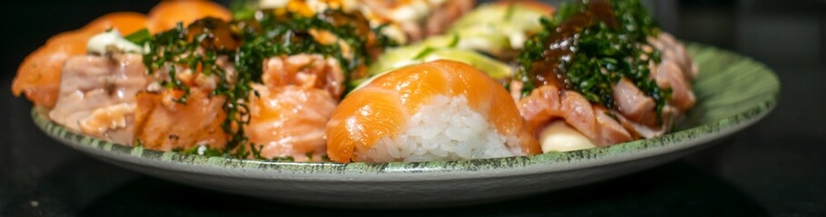 JAPANESE ORIENTAL CUISINE SUSHI AND OTHERS WITH SALMON FISH