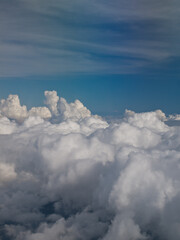 Over the withe clouds below a blue sky