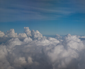 Over the withe clouds below a blue sky