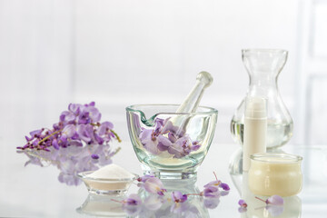 Essential oil and glycine powder rich in amino acid in glass bottles.