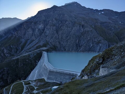 View of the Grande Dixence dam shortly before sunrise in the valais alps. fantastic mountain landscape, Lac des Dix