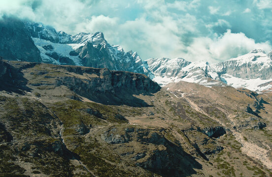 Aerial view of part of the Matterhorn Mountain range with a sight of some beautiful peaks and icy ravines in Cervinia, Aosta Valley, Italy.