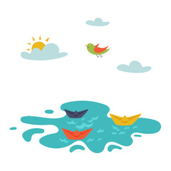 Paper boats in the water
