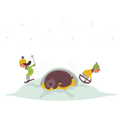 Children skating down slide winter