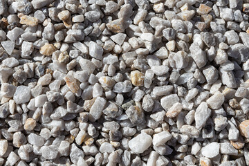 Beautiful texture of transparent white quartz crystal rough stones. Natural stones and minerals