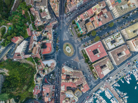 Aerial view of a roundabout with vehicles in Naples downtown, Naples, Campania, Italy.