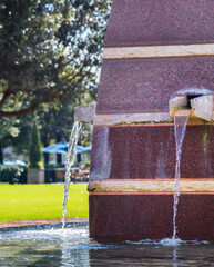 Relaxing water fountain in a park in Frisco Texas - obrazy, fototapety, plakaty