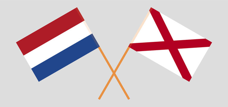 Crossed flags of the Netherlands and The State of Alabama. Official colors. Correct proportion