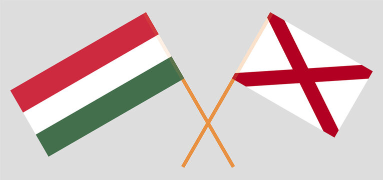 Crossed flags of Hungary and The State of Alabama. Official colors. Correct proportion