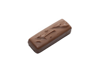chocolate bar, filled with walnuts and caramel.  Isolated on white background