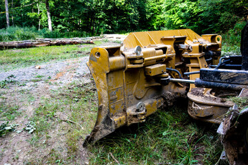 Forest tractor for logging after sawing trees, heavy forestry equipment