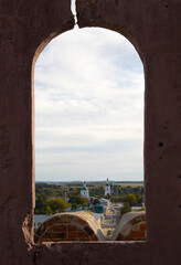 view of the city through the window of the old tower