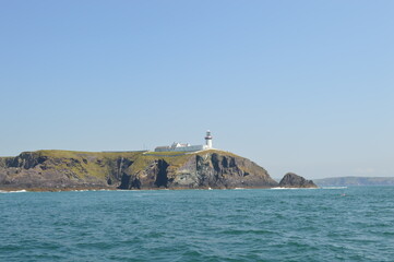 Atlantic Ocean. West Cork. Ireland. Rocks. Cliffs.  Lighthouse. Beacon.