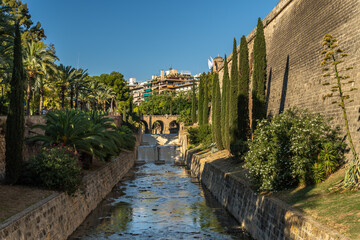 Fototapeta na wymiar General view of the Sa Riera Torrent in the historic center of Palma de Mallorca at sunset