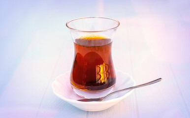 Glass cup of black turkish Tea