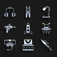 Set Rocket ship, Waistcoat, Fountain pen nib, UFO flying spaceship, Virtual reality glasses, Ray gun, Table lamp and Headphones icon. Vector