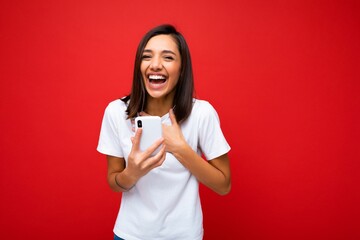 Photo of attractive crazy amazed surprised young woman wearing casual stylish clothes standing...