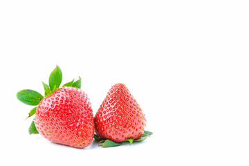 Two strawberries isolated on white background with copy space. Fruit  have high vitamins.