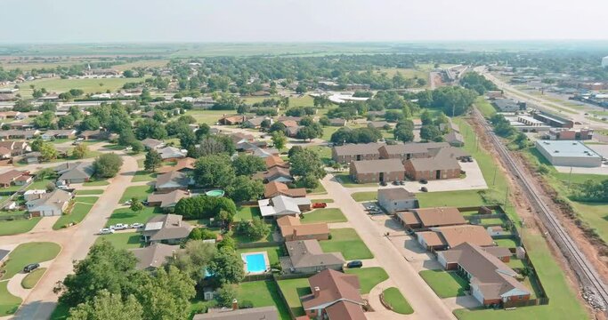 Panorama landscape scenic aerial view of a suburban settlement in a beautiful detached houses the Clinton town Oklahoma US