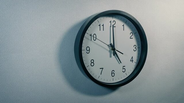 5 O'Clock Wall Clock Moving Shot
