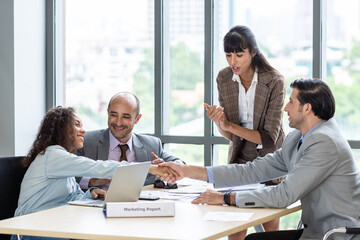 Businesspeople discussing together in the conference room during meeting at the office.