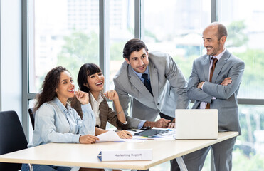Businesspeople discussing together in the conference room during meeting at the office.