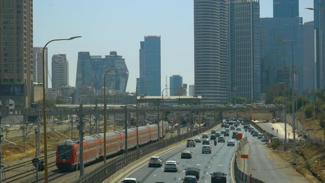 Skyline view of Tel Aviv, Ayalon highway traffic on midday, Gush Dan