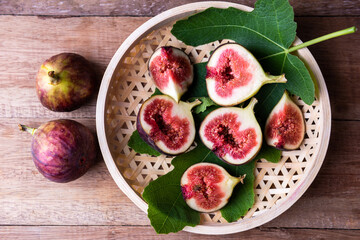 Fresh purple figs in bamboo baskets